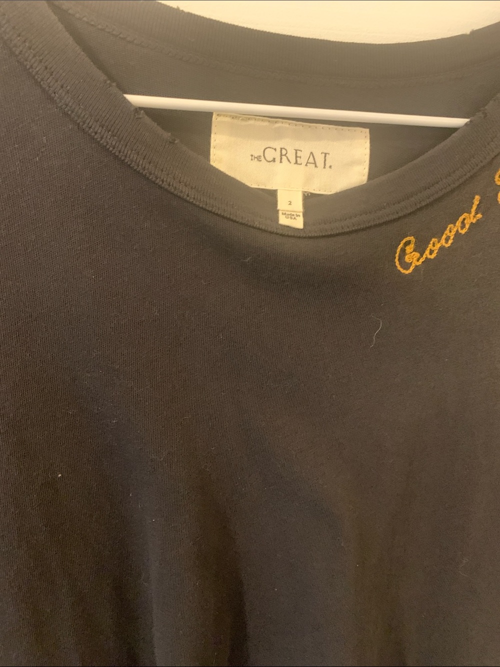 THE GREAT. Black “Good JuJu “Tee with Gold Embroidery. Size 2.